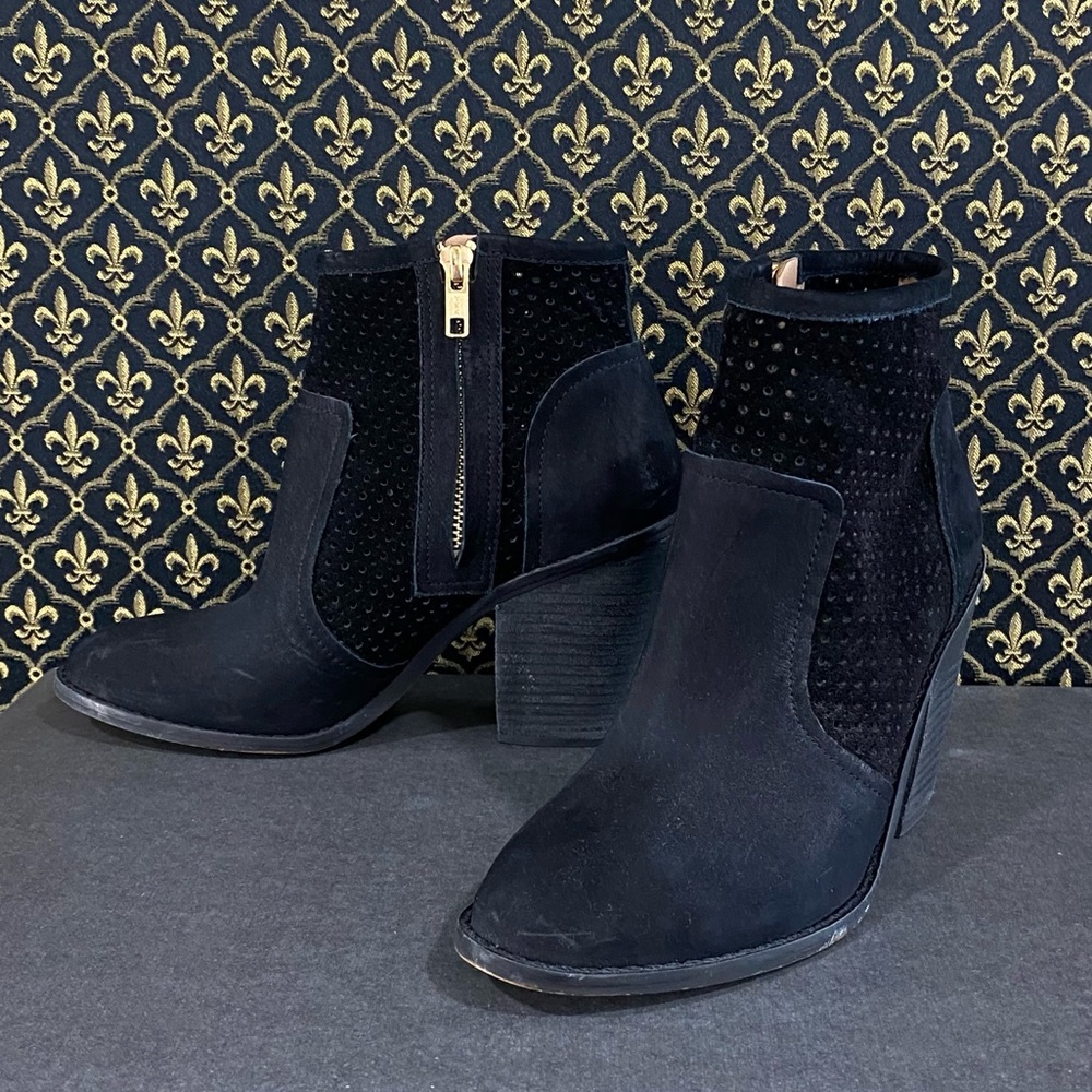 Anthro “Perforated Heeled Bootie”